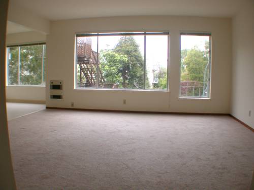 Image of living room, dining area and view from windows