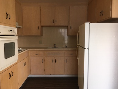 Kitchen with updated oven and refrigerator