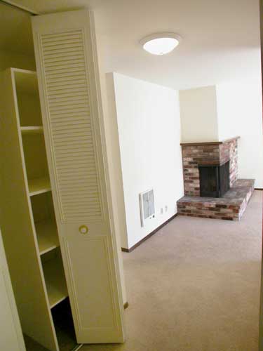 Entry with hallway closet leading into living room