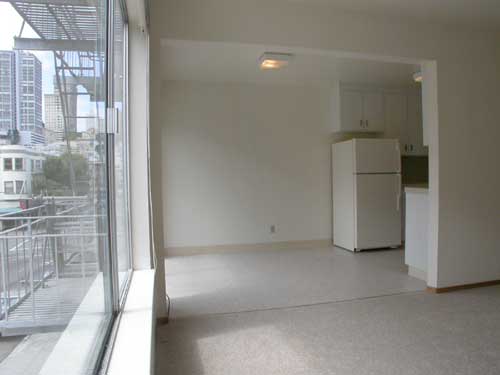 Living room and dining area with view from window