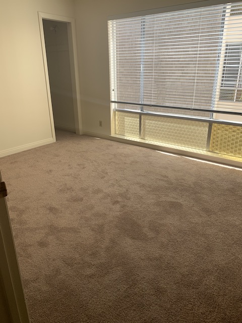 Bedroom with walk in closet