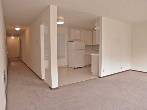 Hallway, kitche, dining area and part of living room